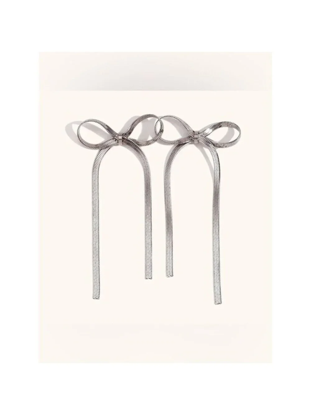 Silver Bow Drop Earrings Q1037